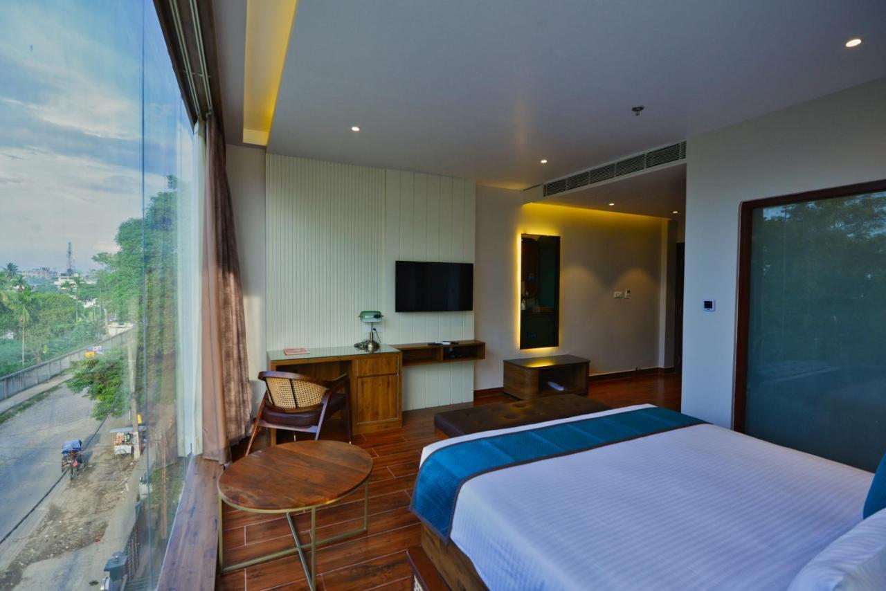 The Convoy Hotel ดิบรูการ์ ภายนอก รูปภาพ